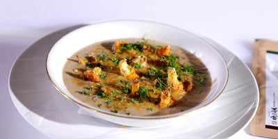 Mushroom Potage with Mimolette and Chanterelle Mushrooms