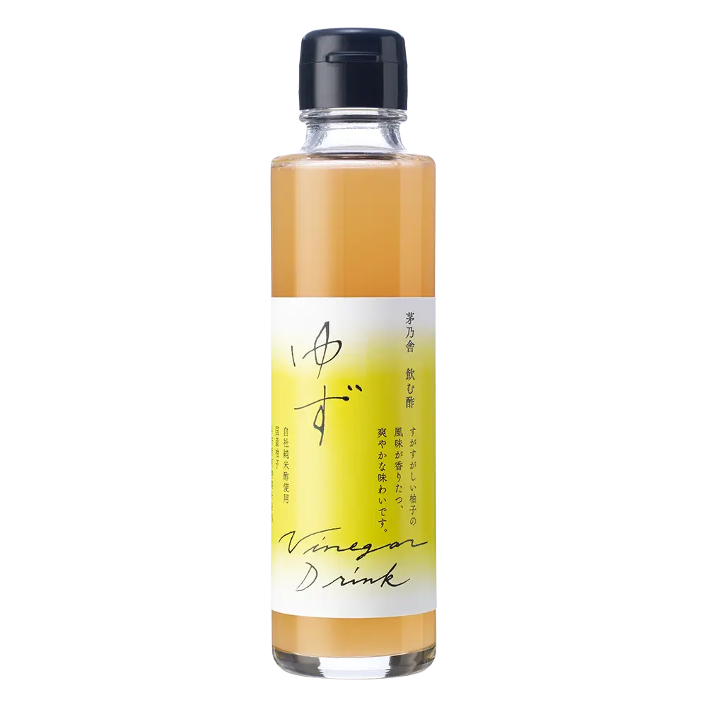 Bottle of Kayanoya vinegar drink with a yellow label on a white background