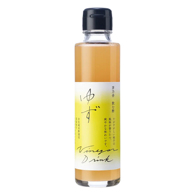 Bottle of Kayanoya vinegar drink with a yellow label on a white background
