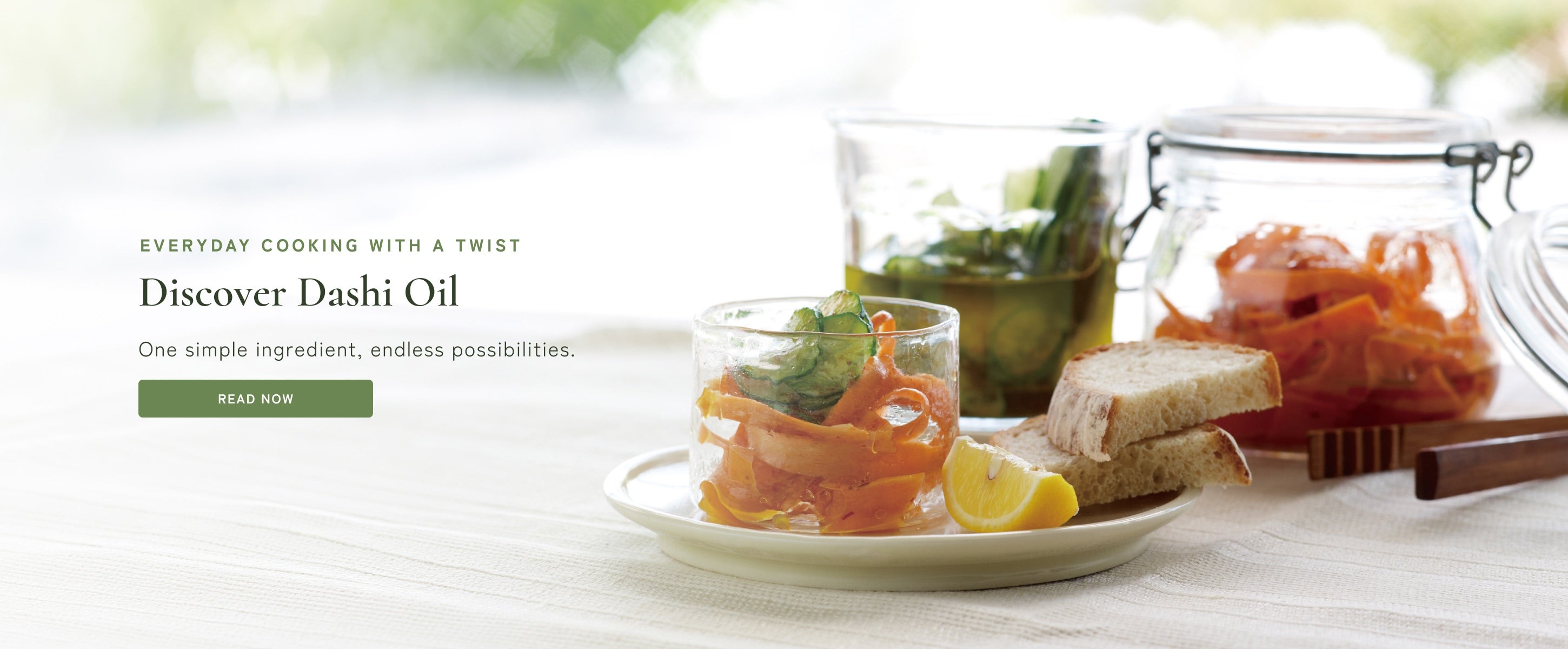 Carrot ribbons and cucumber slices marinated in homemade dashi oil, showcasing an easy way to add umami to everyday vegetables.