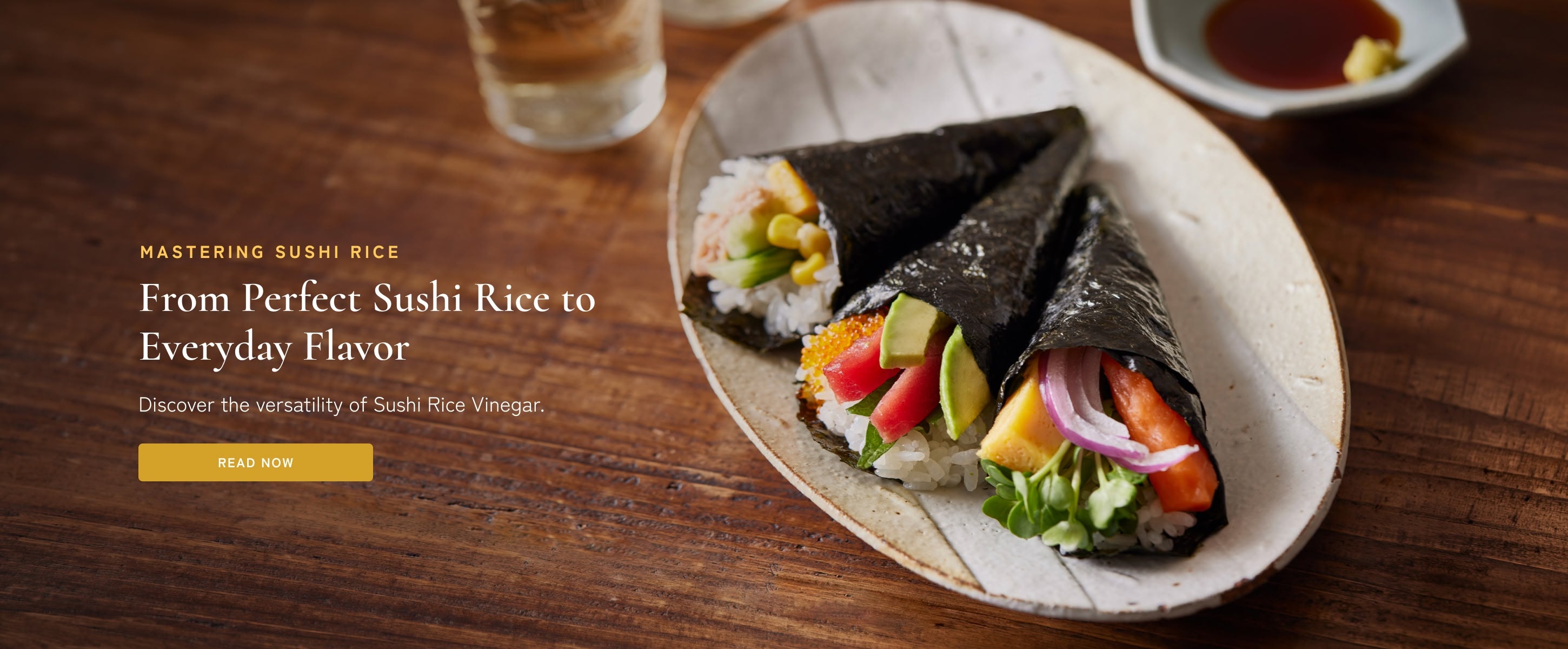 Hand rool made with seasoned sushi rice, Japanese sushi rice vinegar, salmon, avocado, and fresh vegetables.