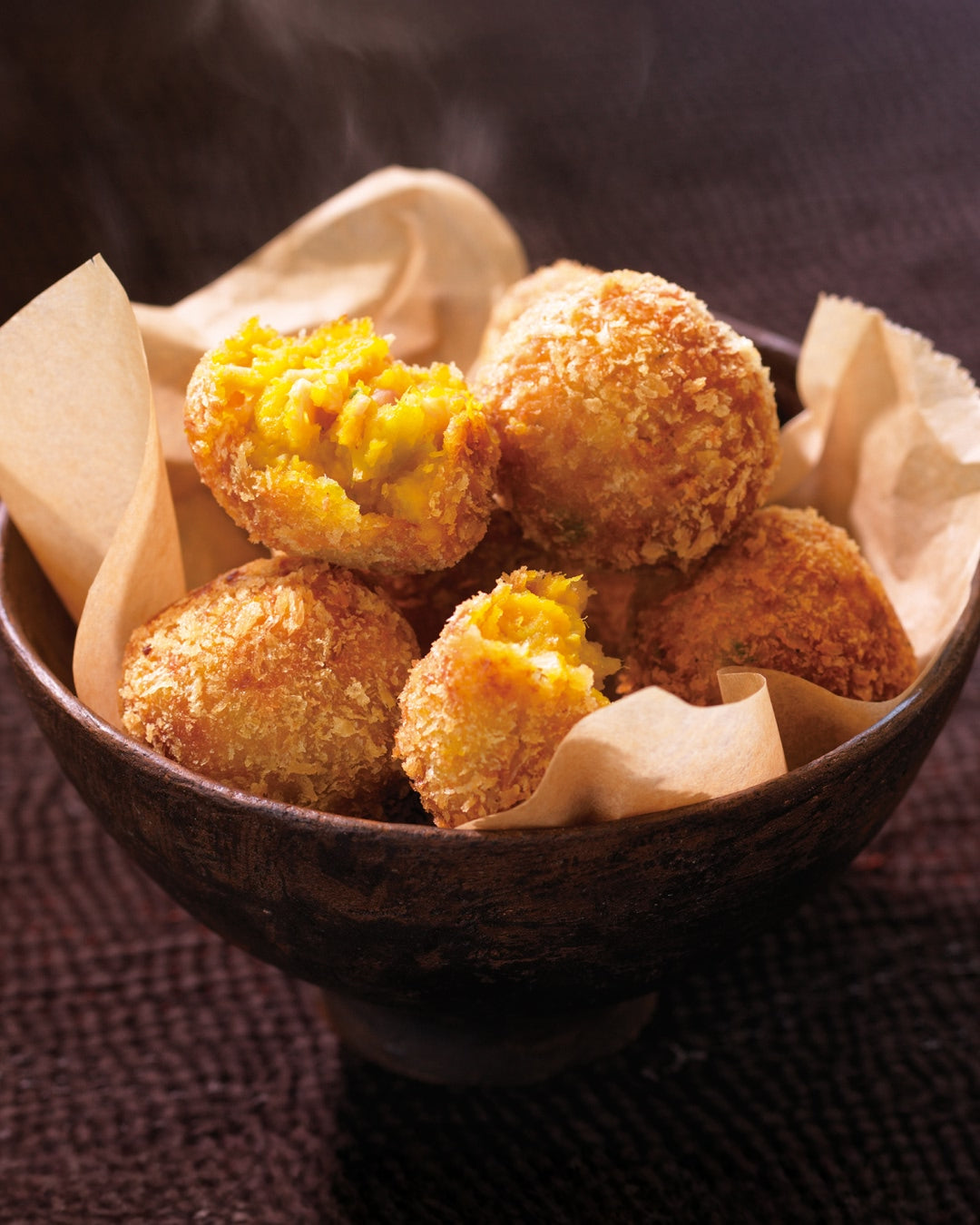 Pumpkin croquettes served hot in a bowl.