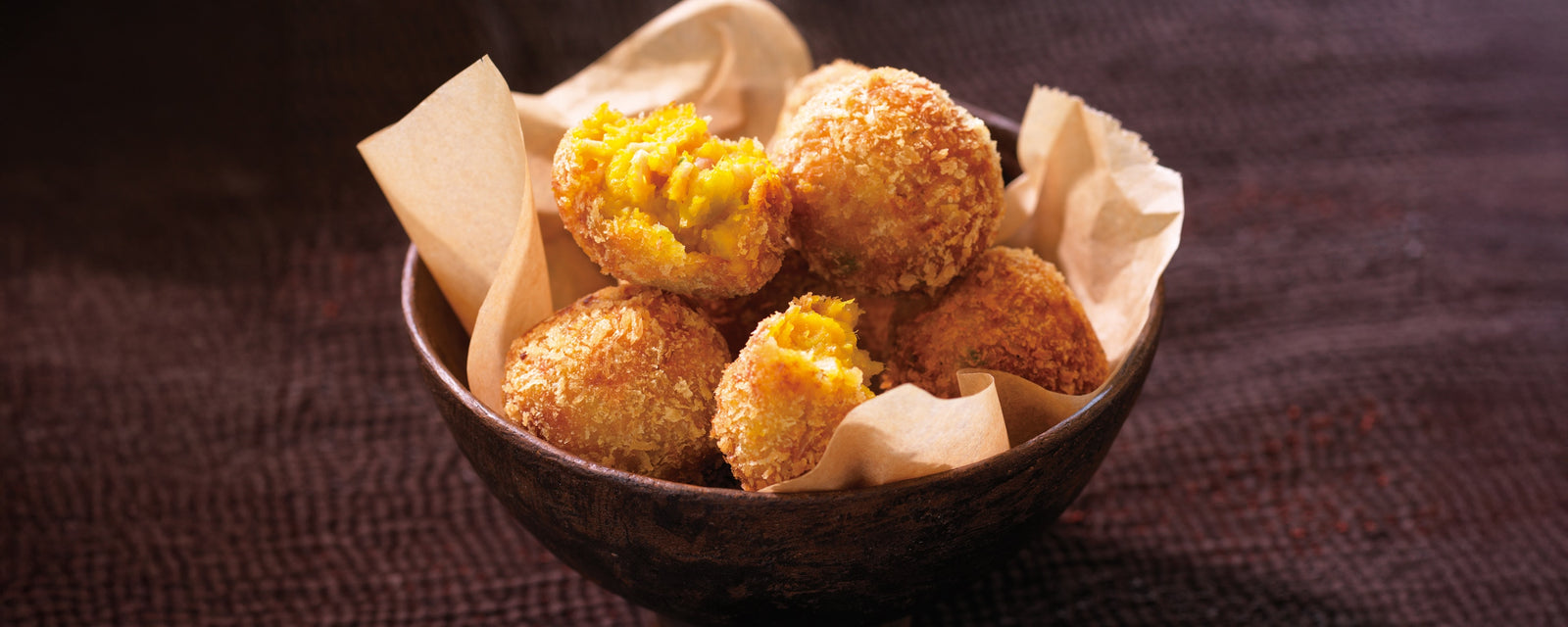 Pumpkin croquettes served hot in a bowl.