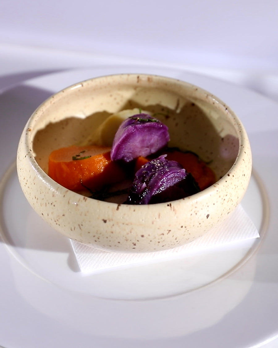 Japanese three-color sweet potatoes served in a ceramic bowl.