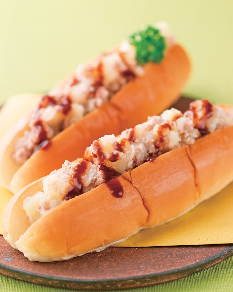 No-fry Japanese croquette rolls filled with mashed potato and ground beef, drizzled with tonkatsu sauce on soft bread.