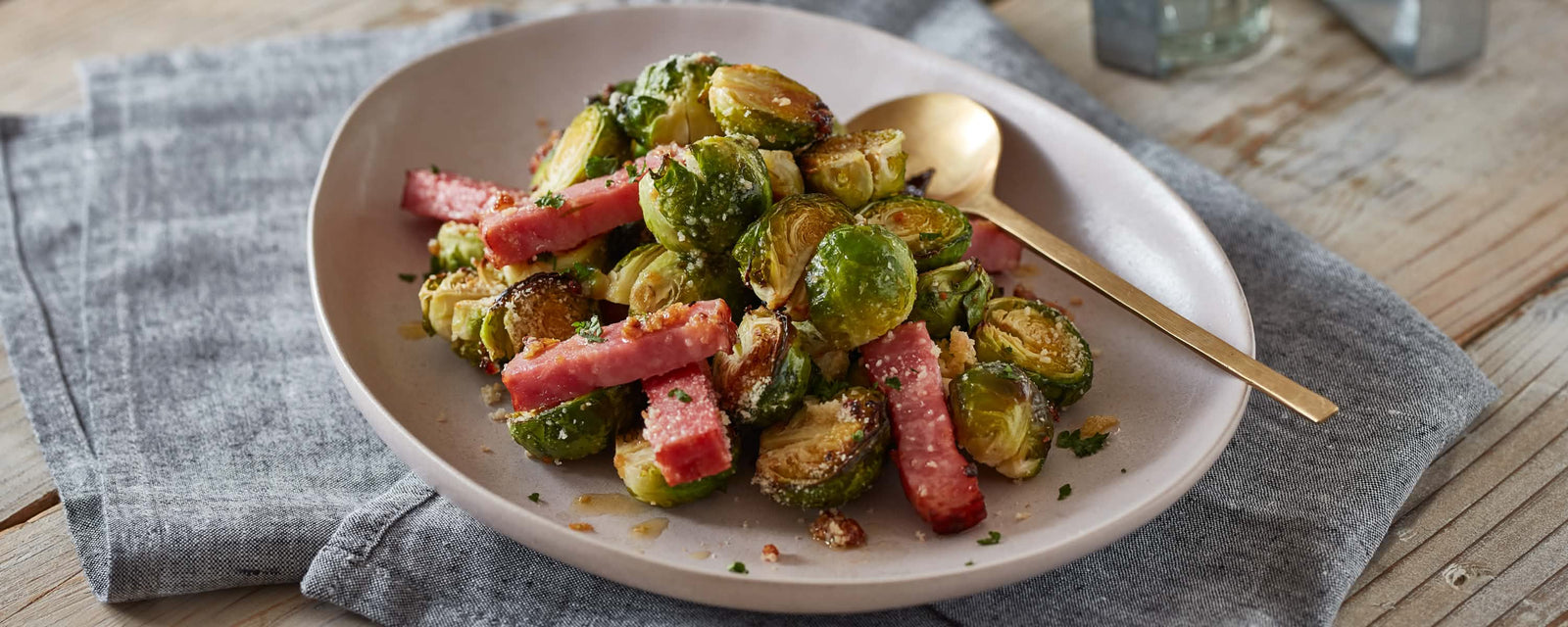 Roasted Brussels sprouts with bacon and grated cheese