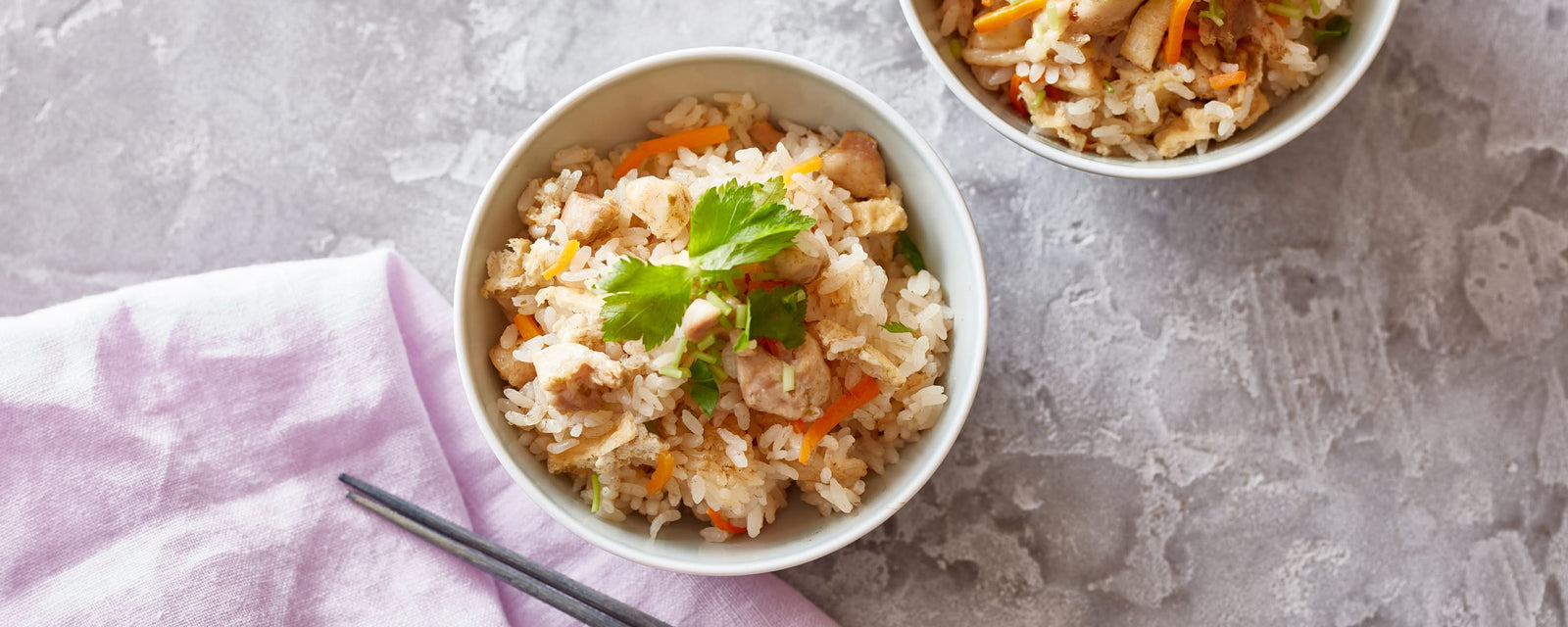 Japanese mixed rice with chicken, vegetables, and fresh herbs