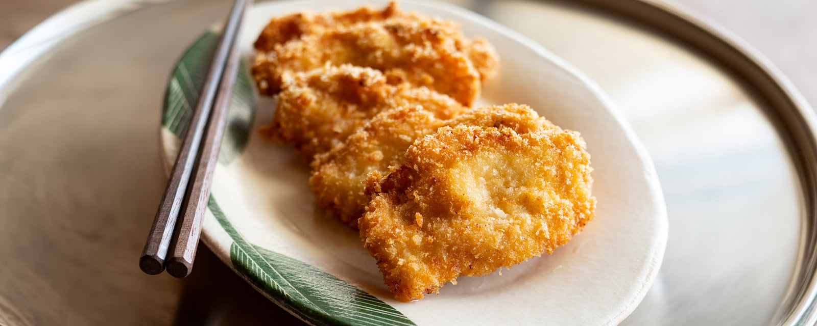 Golden, crispy Chicken Katsu made with Kayanoya Vegetable Dashi, featuring tender chicken breast coated in panko breadcrumbs.
