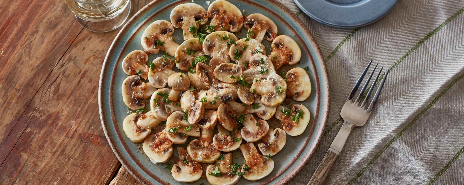 Fresh mushrooms with garlic, parsley, Parmesan cheese and dashi olive oil