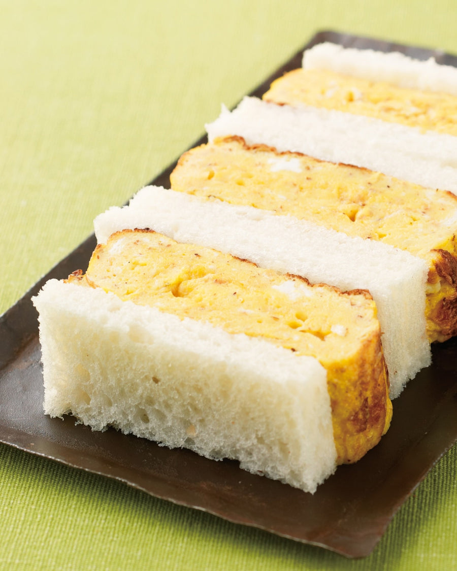 Japanese sandwich with thick slices of omelet between soft white bread