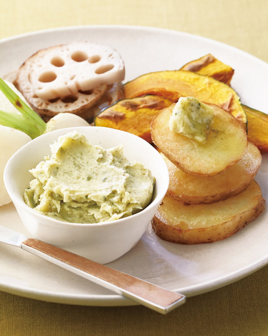 Assorted roasted and sautéed vegetables including potatoes, kabocha squash, lotus root, and turnip with kelp dashi butter on the side, 